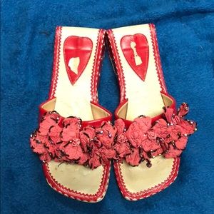 Red flower flats.